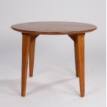 Gordon Russell circular table, the circular top with four tapering legs, the underside with a