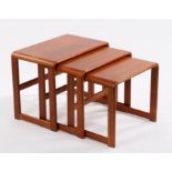 Nest of three teak occasional tables by O'Donnell design Ltd. the tables with curved edges, on