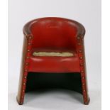 Clarks Shoe shop chair, the red leather with impressed Clarks in gilt lettering with a tub back