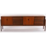 Mid 20th Century teak sideboard, with three sliding doors, cutlery drawer and two further drawers,