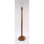 Art Deco walnut standard lamp, the hexagonal tapering stem raised on a hexagonal plinth base,