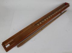 "Cueball" snooker game, the sloping wooden board with score roundels to one side, housed in original