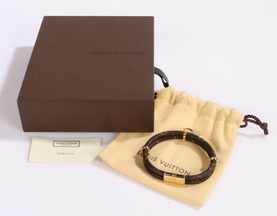 Louis Vuitton, a ladies 'Keep It Twice' bracelet, with padlock charm, with original box and