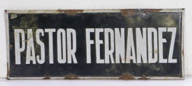 Enamel sign, the black ground with white lettering "PASTOR FERNANDEZ", 44.5cm x 18cm