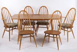 Ercol Quaker pattern blonde elm and beech dining table and six chairs, consisting of dining table