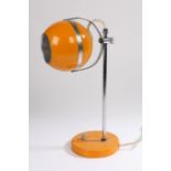 Mid 20th Century "eye ball" table/desk lamp, the orange sphere lamp above a chromed column and