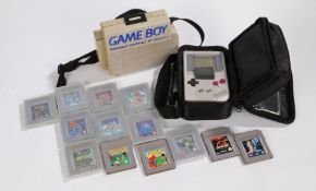 Nintendo Gameboy handheld console, together with fourteen games, Tetris (2), Super Mario Land, Super