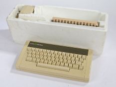 Acorn Electron computer, housed in original box