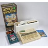 Acorn Electron computer, housed in original box, together with Tree of Knowledge, Chess and Super