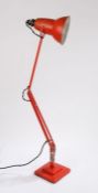 Mid 20th Century  Anglepoise red desk lamp, circa 1940, cast marks 'The Anglepoise, Pat. in UK and