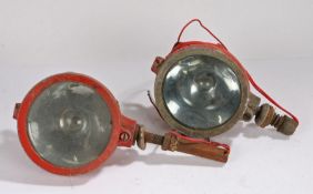 Pair of red painted signalling lamps, 18.5cm diameter