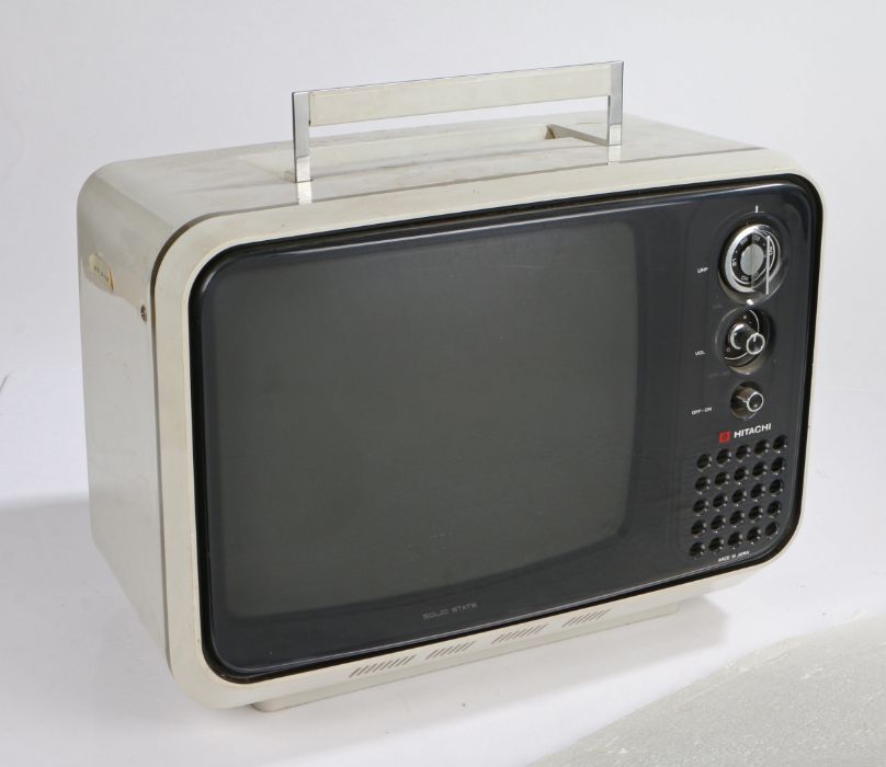 Hitachi Solid State portable television, the white body with carrying handle, 42cm wide
