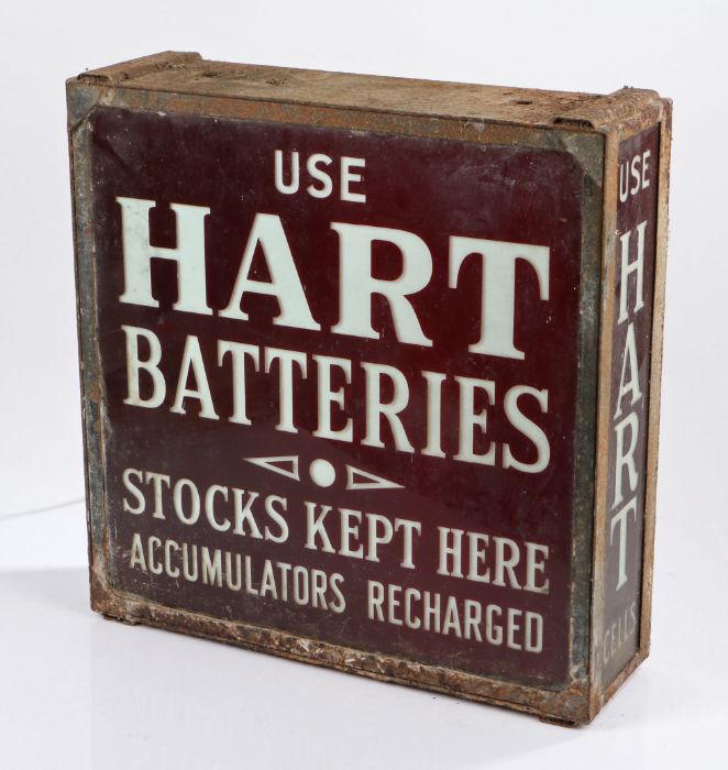 Hart Batteries advertising light box, the glazed front in red with the text USE HART BATTERIES