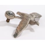 White metal bonnet ornament depicting a grouse in flight, 18cm wide, 16cm long,