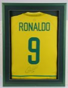 Ronaldo, signed and framed Brazil shirt, lacking COA, housed within a green and glazed frame, 43cm