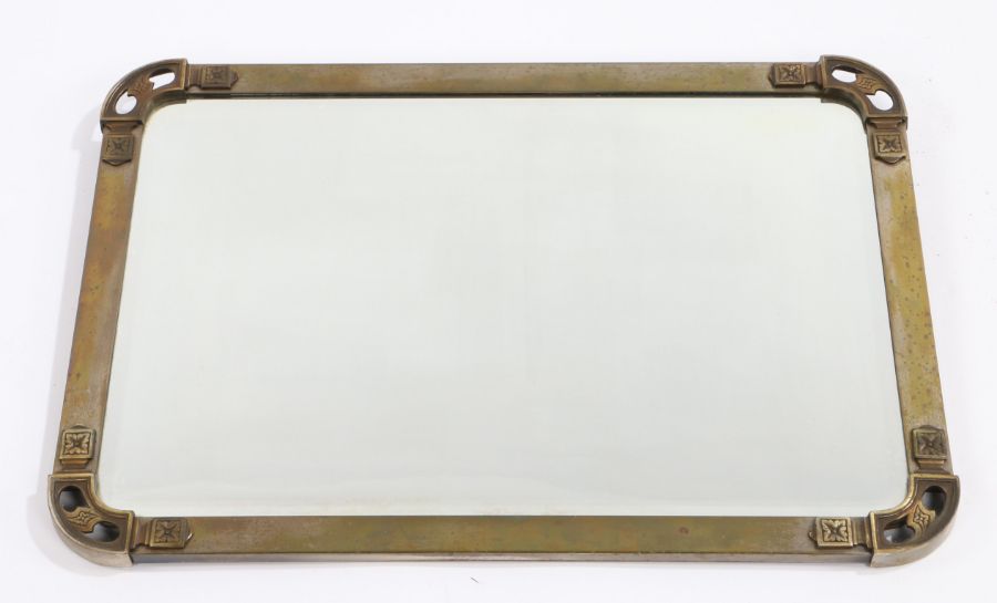 Early 20th Century brass framed wall mirror, the bevelled mirror plate housed in a brass frame