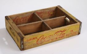 Chattanooga Cases yellow painted Coca-Cola bottle crate, inscribed "DRINK COCA-COLA IN BOTTLES", the