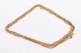 9 carat gold and pearl necklace, with a long chain interspersed with pearls and a pearl set clasp