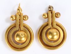 Pair of Victorian yellow metal earrings, with swing orbs to loops, kite marks to the reverse, 13.3