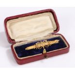 Victorian 15 carat gold and pearl set brooch, Chester 1898, with five pearls set to the bar brooch