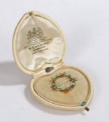 9 carat gold turquoise and pearl set brooch, the circular brooch set with pearl leaves and turquoise