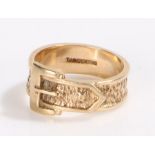 9 carat gold buckle ring, with a wide clasp and leather effect band, 4.8 grams, ring size O