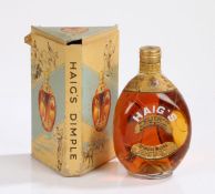 Mid 20th Century Haig's Dimple Scotch whisky, the dimple bottle with original wire netting, housed