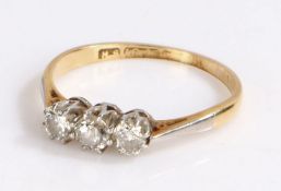 18 carat gold three diamond set ring, with three diamonds to the head, 1.8 grams, ring size K