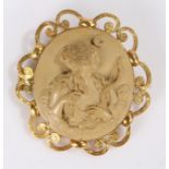 Victorian lava cameo brooch, the brooch carved as a classical maiden holding a bow and area with a