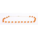 9 carat gold mounted necklace, set with reformed amber beads, 76.5cm long