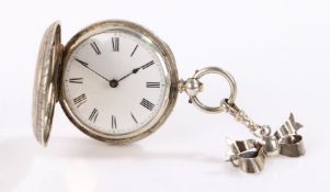 White metal ladies hunter pocket watch, the case with vacant shield shaped cartouche surrounded by