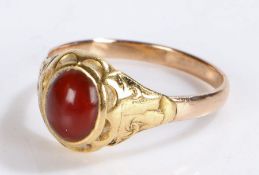 19th Century cabochon ring, the red cabochon cut stone to the head on a later shank, 3.6 grams, ring