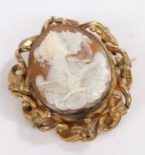 Victorian cameo brooch, depicting two neoclassical ladies and an eagle, decorated with a yellow