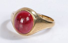 9 carat gold ring, set with a cabochon cut red stone, 4.8 grams, ring size U 1/2