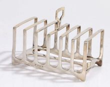 George V silver toast rack, Birmingham 1930, maker Adie Brothers Ltd. the pierced angular handle