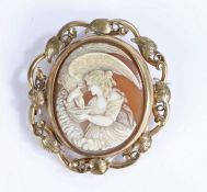 Victorian cameo brooch, carved depicting a lady and eagle feeding from a bowl, 65mm diameter