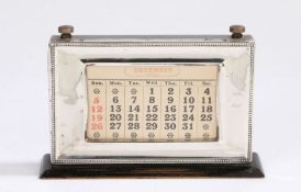 George V silver mounted desk calendar, Birmingham 1930, maker W J Myatt & Co. the ebonised body with