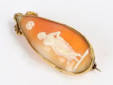 19th Century cameo brooch, carved depicting a figure of a maiden below a flower set within a