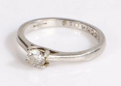 Platinum and diamond set solitaire ring, the round cut diamond at approximately 0.20 carat, 3.6
