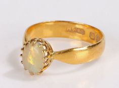 22 carat gold opal set ring, the cabochon opal with a shaped shank, 4 grams, ring size P