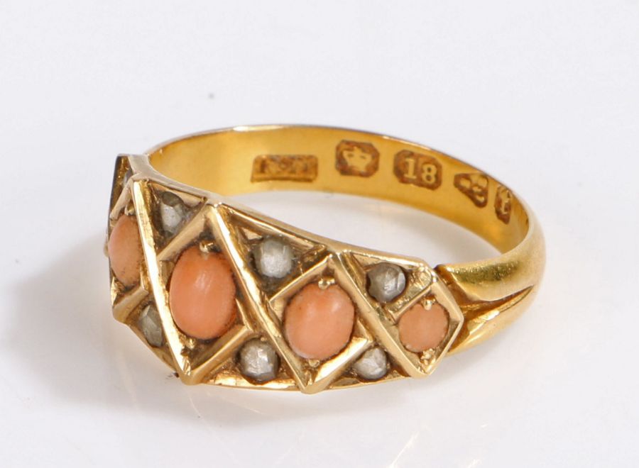 Victorian 18 carat gold coral and diamond set ring, Chester 1882, with five corals to the head and