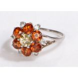 9 carat white gold ring, set with multi coloured gemstones forming a flower head, 2.6 grams, ring