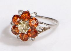 9 carat white gold ring, set with multi coloured gemstones forming a flower head, 2.6 grams, ring