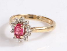 10 carat gold ring, set with a pink stone forming a flower head, 2.5 grams, ring size M 1/2