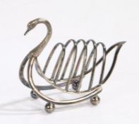 Novelty silver plated toast rack, modelled as a swan, with five arched divisions, raised on orb