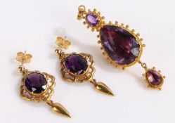 19th Century Yellow metal Amethyst pendant, of tear drop form, 40mm long, together with a pair of