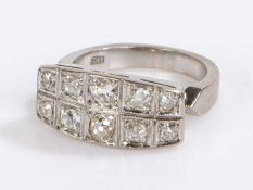 18 carat white gold and diamond ring, white gold shank set with ten diamonds, 5.8 grams, ring size