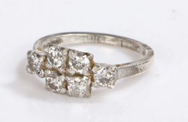 Indian white metal diamond set ring, with six round cut diamonds to the head, 2.8 grams, ring size