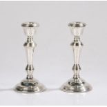 Pair of Elizabeth II silver candlesticks, Birmingham 1974, maker W I Broadway & Co. with reeded