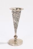 Chinese silver specimen vase, the tapering body with embossed blossoming branch decoration, on a